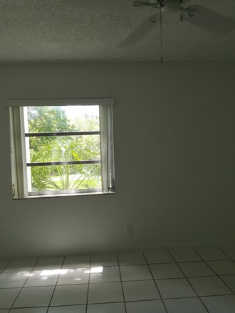 Bedroom w/view of canal - 604 NW 13th St