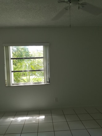 Bedroom w/view of canal - 604 NW 13th St