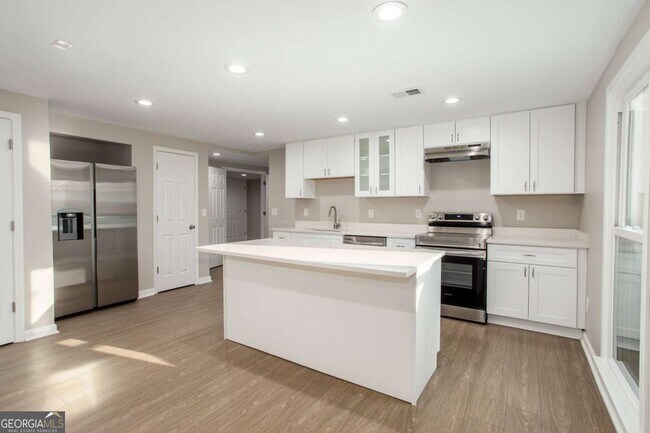 Foto del edificio - 5647 Queensborough Dr