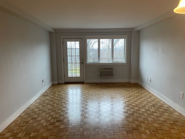 Large living/dining space with a view of the park - 1070 Kennedy Blvd