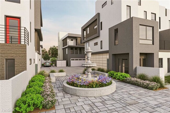 Building Photo - 4 br, 3.5 bath House - 719 W Duarte Rd Unit A