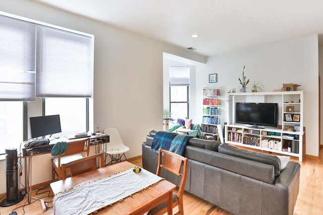 Photo - Noble Square Large 2 Bed w/Central Heat & A/C, Only 2 Blocks to the Blue Line, In-Unit Laundry. F... Apartment