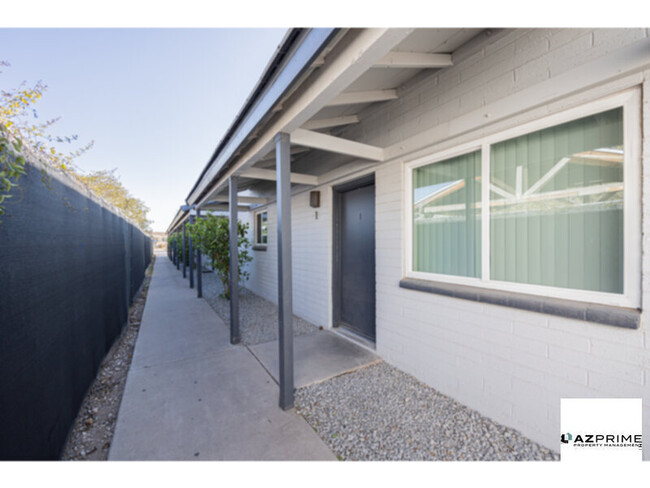 Building Photo - Step into this Charming Phoenix 2/1 unit i...