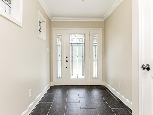 Building Photo - Perfect location right off of Lawyers rd!