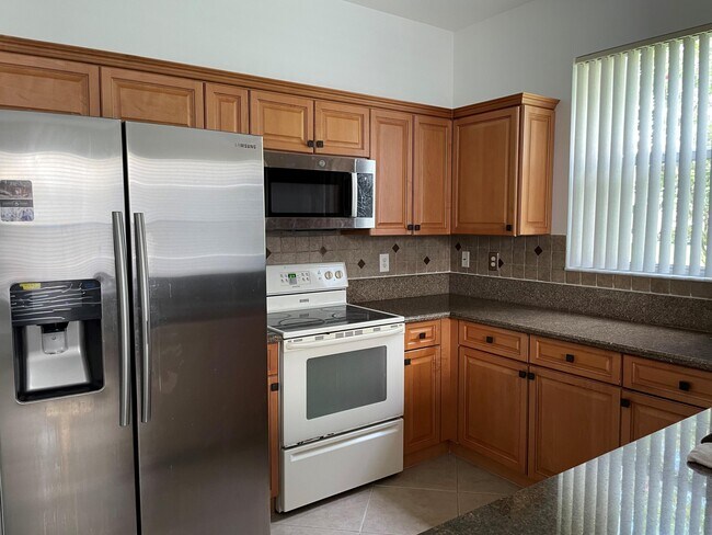 Building Photo - 6028 Seminole Gardens Cir