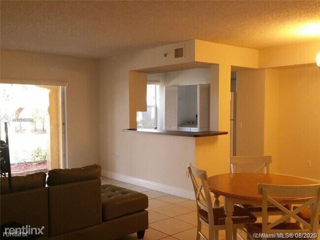 Building Photo - 2 br, 2 bath Condo - 9045 Pines Blvd