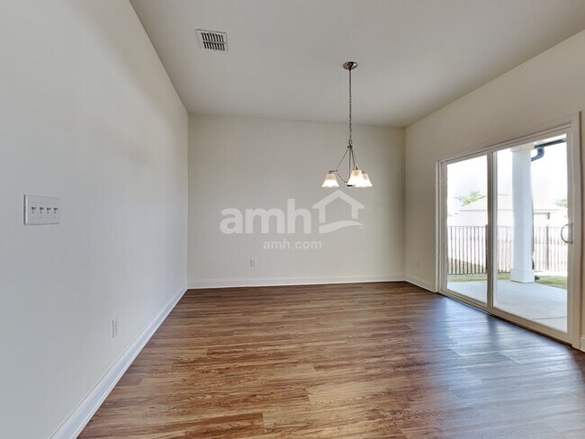 Building Photo - 902 Sunny Stroll Drive