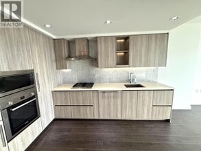 Building Photo - 4720 Lougheed Hwy.