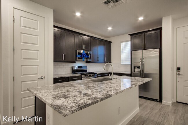 Foto del edificio - 4 br, 2.5 bath House - 1087 E Chapman Drive