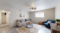 Located at 7217 S Walker Ave in Oklahoma City, this single-story, 3-bedroom, 1-bathroom home offers a practical and comfortable layout across its efficiently designed floor plan. Wood-look luxury vinyl flooring flows consistently throughout, lending a clean, cohesive look to every room.

The living room is a welcoming space featuring a ceiling fan with light fixture, a window providing natural light, and neutral-toned walls with a textured finish. It connects seamlessly to a dedicated dining area, which offers enough room for a full dining table and opens to the kitchen.

The kitchen is equipped with warm honey-toned wood cabinetry, dark laminate countertops, a double-basin sink, a dishwasher, and a full-size refrigerator — providing ample functionality for everyday cooking and meal prep.

The three bedrooms are bright and comparably sized, with the primary bedroom offering a generous footprint. Each room features the same wood-look flooring and neutral walls, creating a calm, versatile space. Windows in the bedrooms allow natural light to filter in.

The bathroom includes a full-size soaking tub with shower combo, white subway-style tile surround, chrome fixtures, and matching flooring, providing a clean and functional design. A connecting hallway ties all rooms together efficiently, maximizing the use of the home's compact yet well-organized layout.