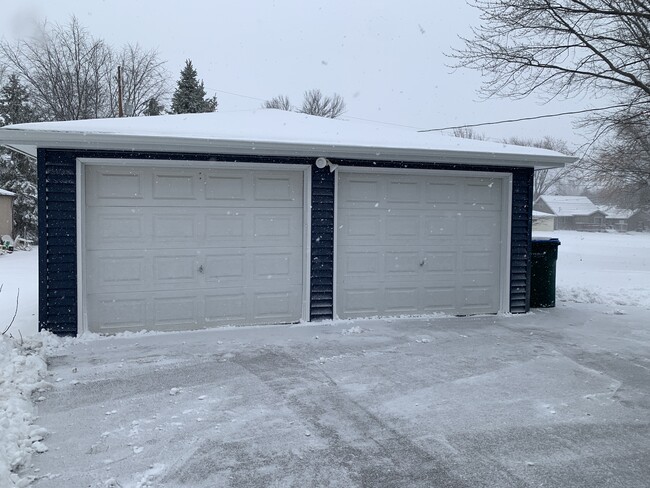 2 car garage with shleving, storage and workbench - 2645 W Spencer St