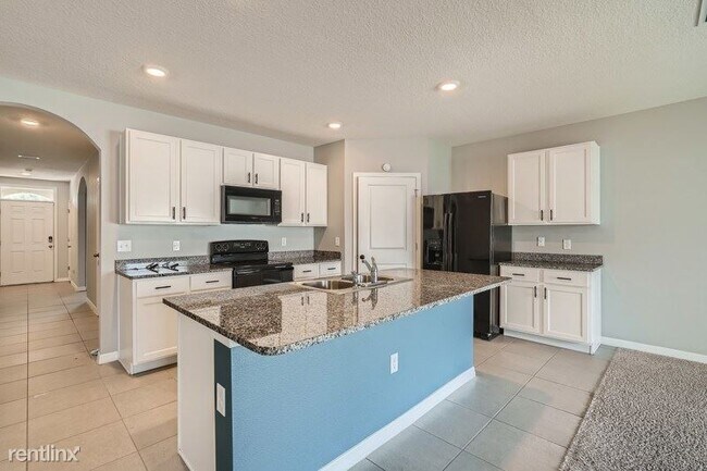 Foto del edificio - 4 br, 2 bath House - 10204 Golden Light Co...