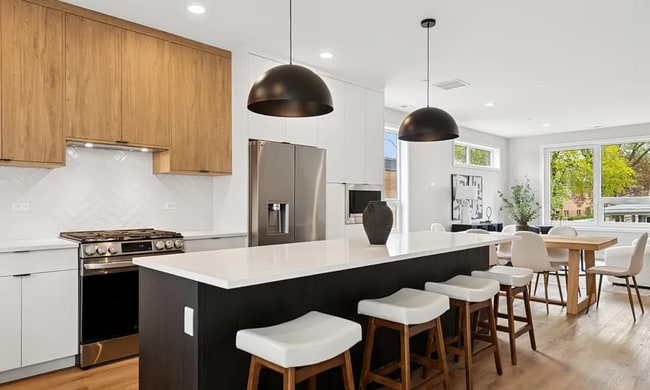 Building Photo - Beautiful New Construction Luxury Townhomes in Forest Park! 3 Bed 2.5 Bath w/ attached 2 Car Garage!