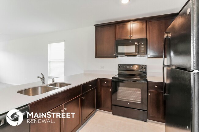 Foto del edificio - 5720 Rockrose Ln