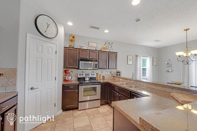 Building Photo - 8209 Sleeping Bear Dr NW