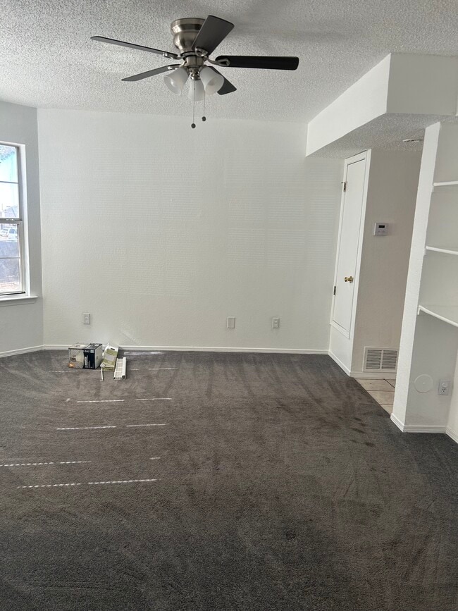 Den with ceiling fan - 1345 Trudy Elaine Dr