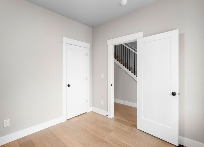 Building Photo - Beautiful New Construction 4-Bedroom Home with a Main-Level Bedroom, Designer Finishes, Attached ...