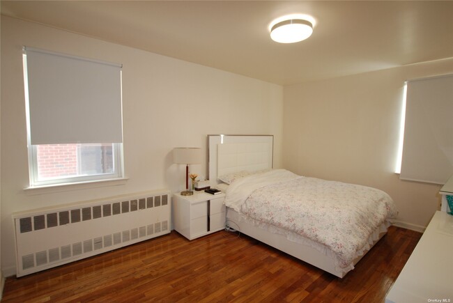 Building Photo - 214-12-214-40 40th Ave