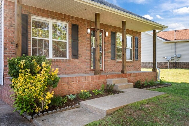 Building Photo - Move-In Special Available! Charming Brick Home with Soaring Ceilings & Updated Finishes!