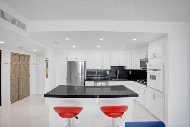 Building Photo - 19390 Collins Ave
