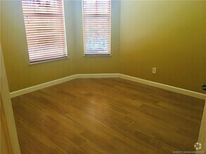 Building Photo - 3582 SW Sawgrass Villas Dr