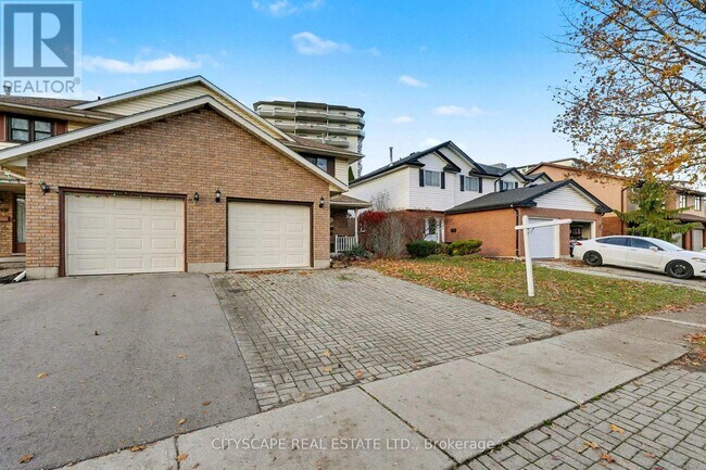 Photo du bâtiment - 575 Springbank Ave N
