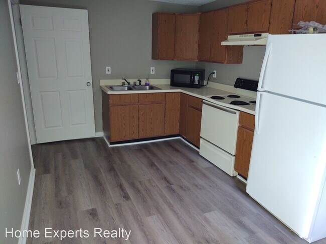 Foto del edificio - 1121-1123 N Lowry Ave