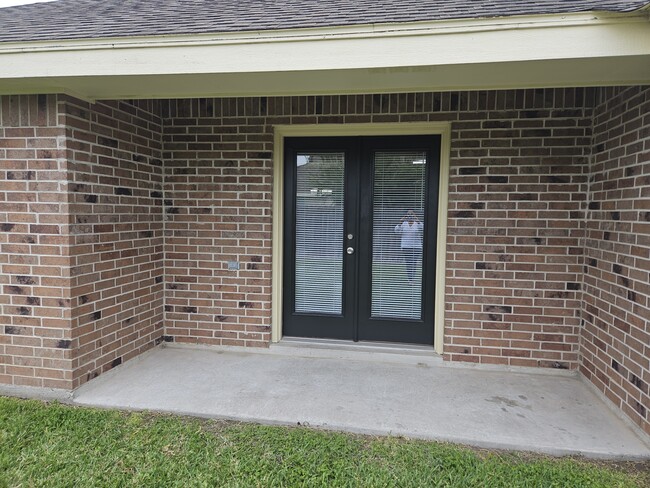 Atrium doors to backyard patio - 2108 Treasure Oaks Dr