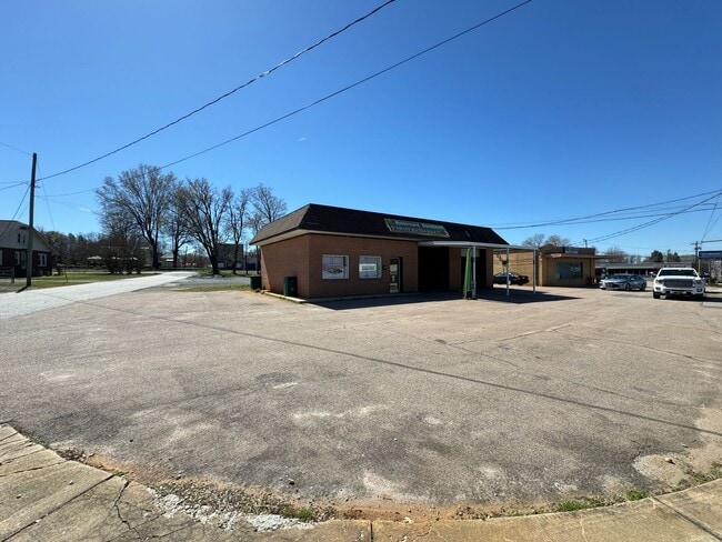 Building Photo - Prime Commercial Space for Rent in Downtown Granite Quarry - 1,323 Sq Ft with Bay Doors