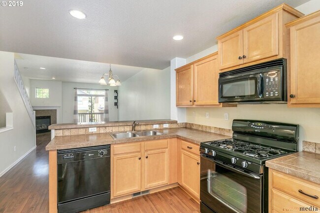 Building Photo - 17444 SW Rose Petal Lane - Spacious Open F...