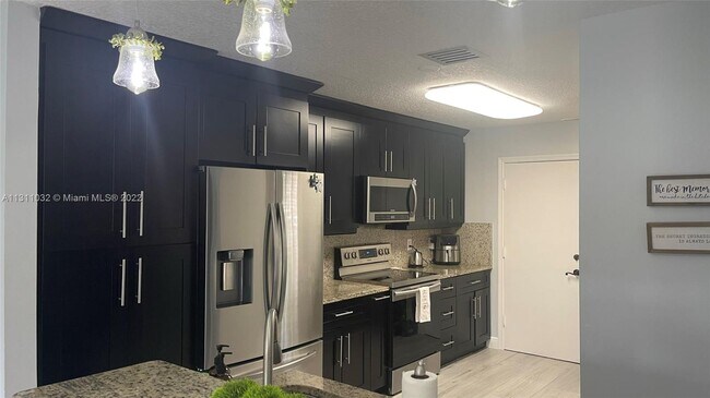 Foto del edificio - 10138  Royal Palm Blvd  401-4 Coral Spring...