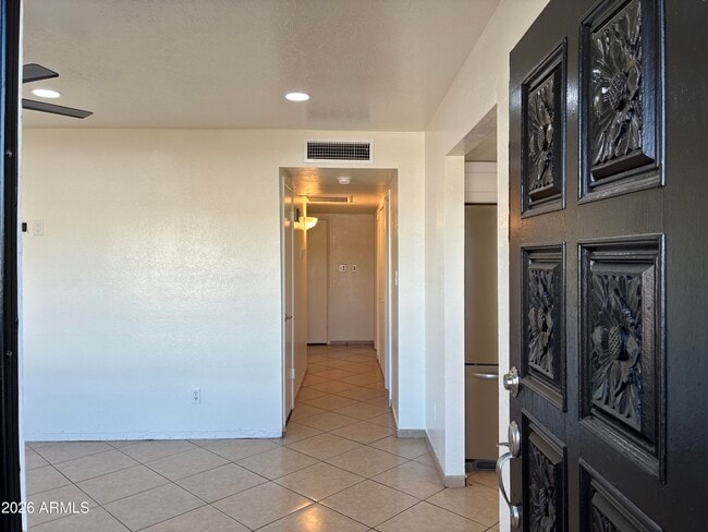 Building Photo - 8819 W Roma Ave