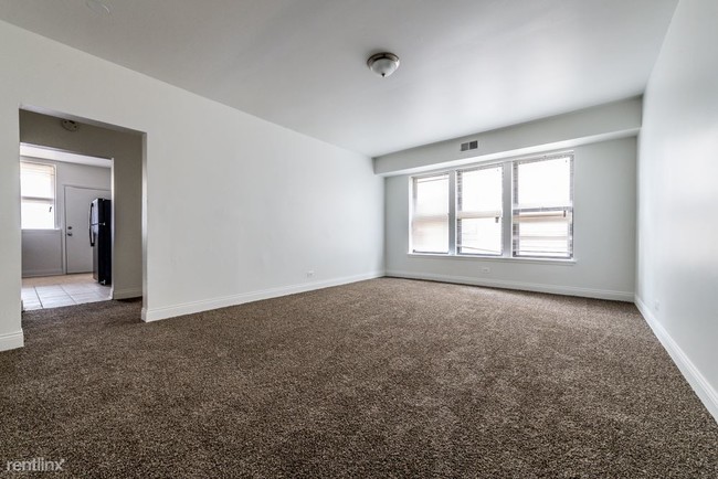 Building Photo - 4 br, 2 bath Apartment - 5046 S Champlain Ave