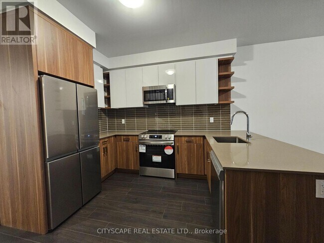 Photo du bâtiment - 32 Deep Roots Ter