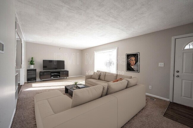 Foto del edificio - 8830 E 35th St