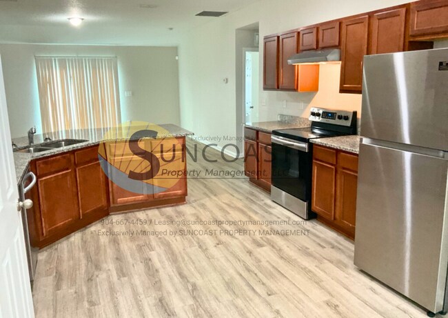 Building Photo - MOVE NOW! Spacious & Cozy 4/2 Home in West...