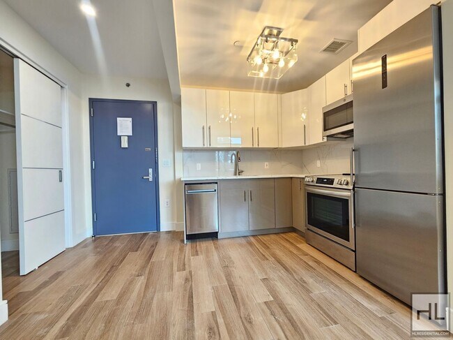 Foto del edificio - Spacious Studio with Balcony in Modern Bui...