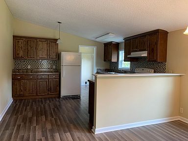 Building Photo - 5579 N Avocado Ln