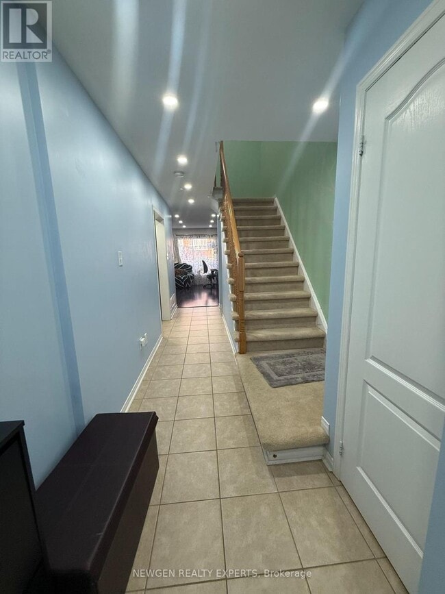 Building Photo - 7360-7360 Zinnia Pl