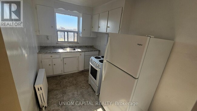 Building Photo - 1969 Eglinton Ave W