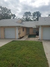 Building Photo - 7638 University Garden Dr