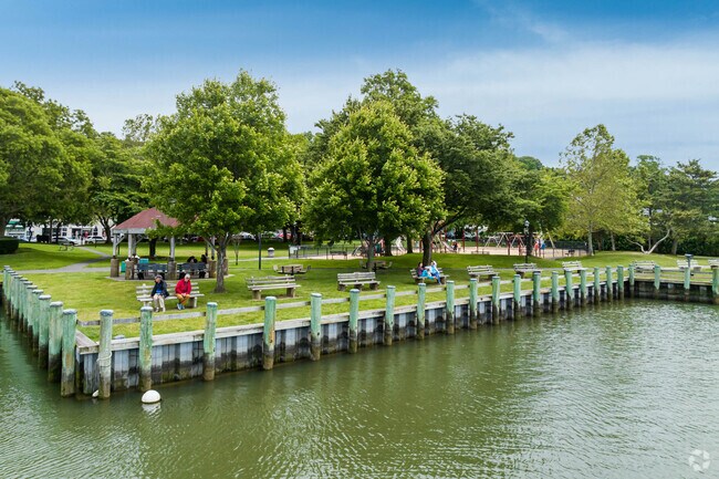 Benches line the shore of Cow Harbor Park in Northport.