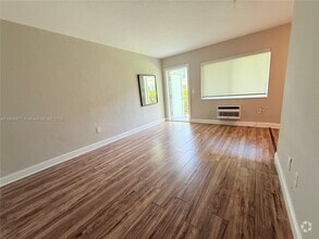 Building Photo - 9270 E Bay Harbor Dr