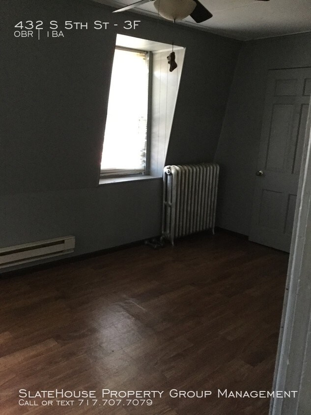 Building Photo - Studio Apartment