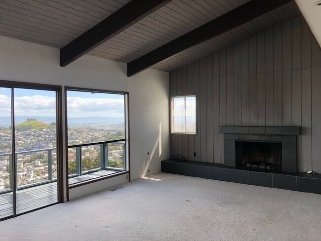 Living room with fireplace and views - 54 Digby St