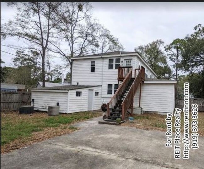 Building Photo - Price Reduced! Stunning Upper-Level Duplex...