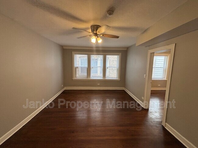 Building Photo - 7935 S Vernon Ave