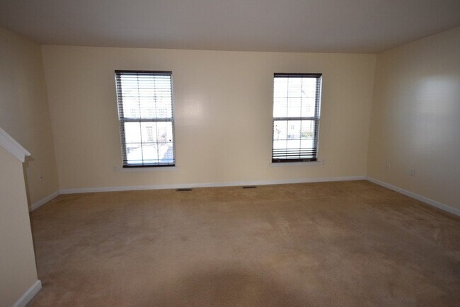 Building Photo - Modern and Sleek Three Bedroom Townhouse