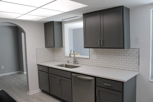 Kitchen (new dishwasher, sink, faucet, backsplash, & cabinets) - 2481 12th Ave SW