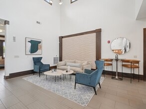 Comfortable resident lounge and gathering spaces at Village at Broadstone Station apartments in Apex, North Carolina - Village at Broadstone Station